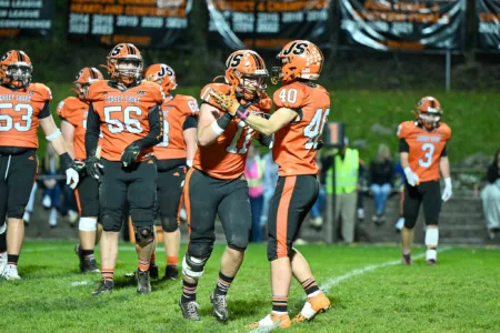 Bulldogs roar past rival Central Mountain, 53-27, on Senior Night